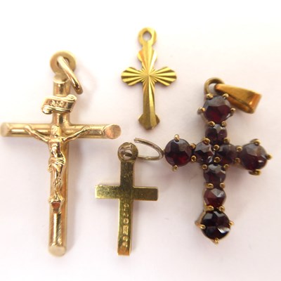 Lot 991 - Four 9ct gold crosses