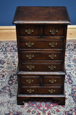 Lot 2632 - A reproduction oak small chest of two short...