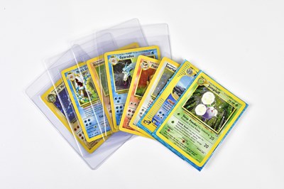 Lot 4435 - POKÉMON; eight holographic Pokémon trading...
