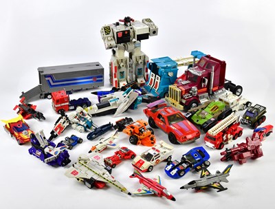 Lot 4382 - TRANSFORMERS; a collection of vintage figures...