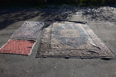 Lot 6478 - A large Eastern style rug with floral...