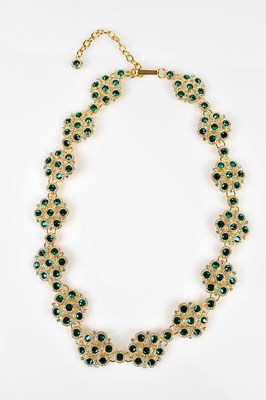 Lot 930 - DOLCE & GABBANA; a gold tone belt embellished...