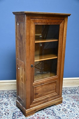 Lot 2631 - A modern pine display cabinet, the single...