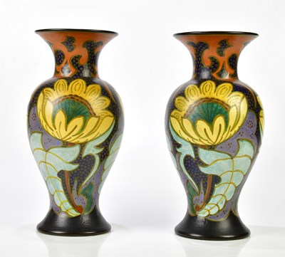Lot 2120 - A pair of Qikan Gouda Art Pottery vases,...