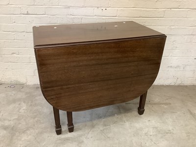 Lot 2651 - A 1920s mahogany drop leaf table on square...