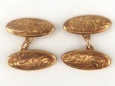 Lot 978 - A pair of 9ct rose gold cufflinks of oval form,...