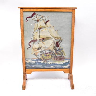 Lot 77 - A mid-20th century oak framed and glazed fire...