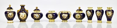 Lot 2052 - COALPORT; a collection of hand painted and...