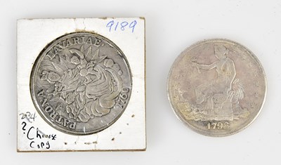 Lot 3216 - A 1796 silver trade dollar, together with a...