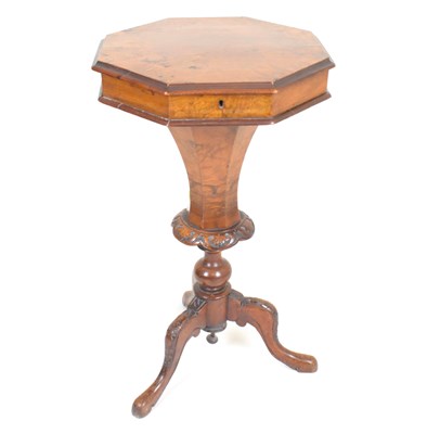 Lot 62 - A Victorian walnut sewing table, the hinged...