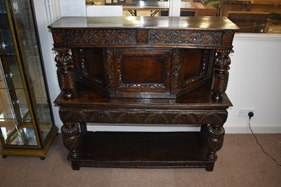 Lot 2356 - An early 17th century carved oak court...