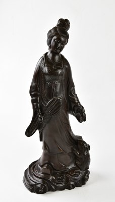 Lot 5312 - A modern carved wooden Chinese figure, height...