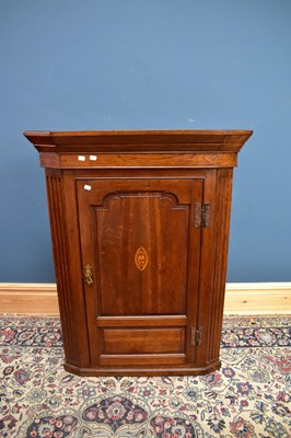 Lot 6669 - A 19th century oak flat front corner cupboard,...