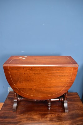 Lot 6753 - A reproduction mahogany Sutherland table,...