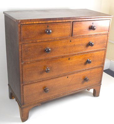 Lot 3 - An early 19th century mahogany chest of two...