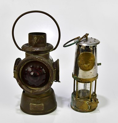 Lot 1395 - A vintage silvered metal and brass miners'...