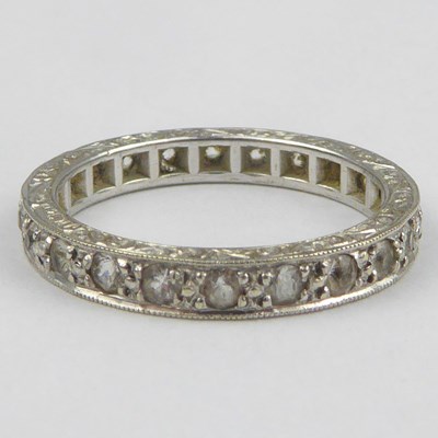 Lot 880 - A 9ct white gold eternity ring with tiny...