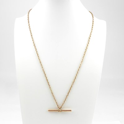 Lot 943 - A 9ct rose gold dainty necklace with 9ct gold...