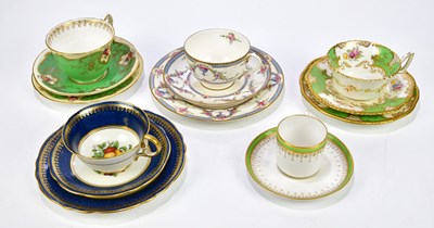 Lot 2044 - ROYAL WORCESTER; a hand painted and gilt...