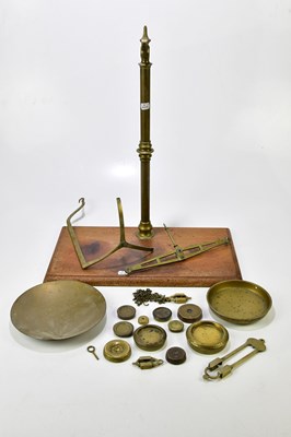 Lot 1561 - A set of Victorian brass balance scales with...