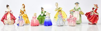 Lot 2230 - ROYAL DOULTON; a collection of eleven figures...