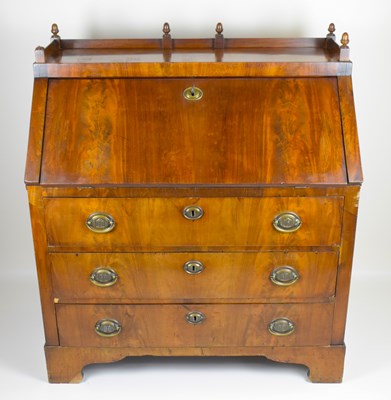 Lot 35 - A Regency and later mahogany fall-front bureau...