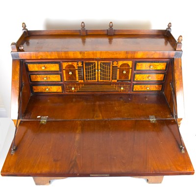 Lot 35 - A Regency and later mahogany fall-front bureau...