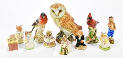 Lot 2258 - BESWICK; two models of birds including owl and...