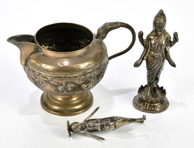 Lot 1193 - A Thai white metal figure of a goddess...
