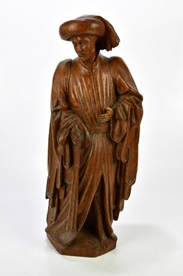 Lot 1545 - A large carved wooden sculpture depicting a...