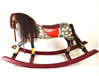 Lot 213 - A vintage rocking horse, height 62cm, length...