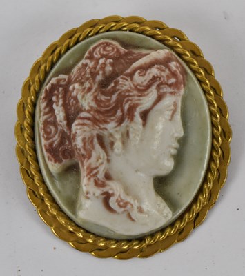 Lot 818 - A yellow metal oval cameo brooch, 6 x 4.5cm.