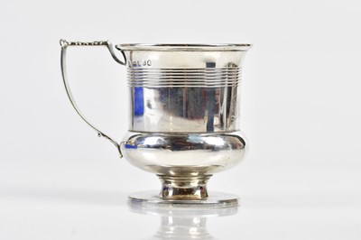 Lot 2384 - A George III hallmarked silver mug, with...