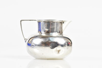 Lot 2632 - An Edward VII hallmarked silver cream jug of...