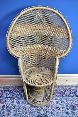 Lot 6693 - A vintage wicker peacock chair.
