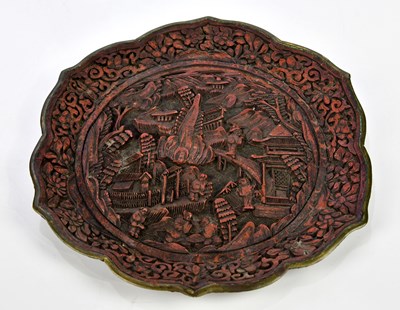 Lot 1200 - A decorative Chinese lacquered dish, decorated...