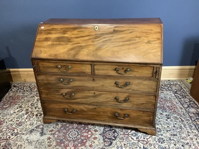 Lot 2513 - A 19th century mahogany bureau, the fall front...