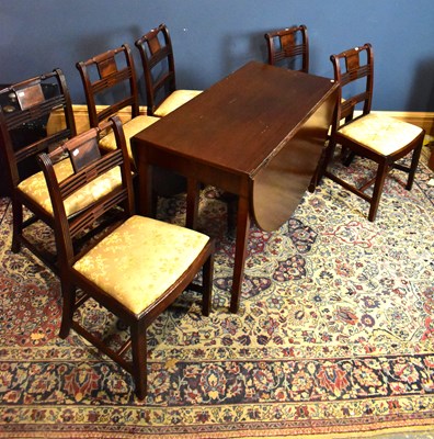 Lot 2469 - A 19th century mahogany drop leaf dining table,...
