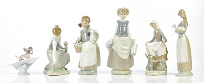 Lot 2183 - LLADRO; six figures to include a puppy and a...
