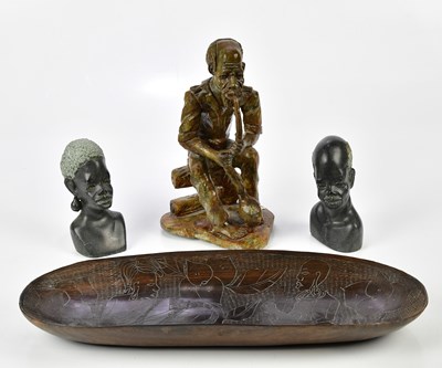 Lot 1225 - A circa 1950s carved African bowl of oval form,...