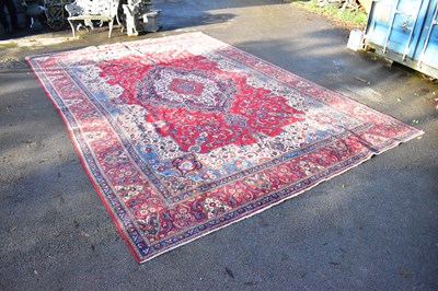 Lot 2284 - A large Eastern carpet decorated with stylised...