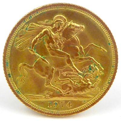 Lot 770 - An Elizabeth II sovereign, 1974, George and...