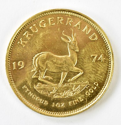 Lot 3053 - A 1974 Krugerrand.