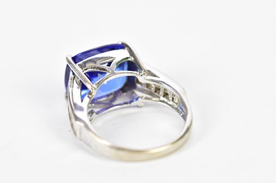 Lot 27 - An 18ct white gold tanzanite and diamond ring,...