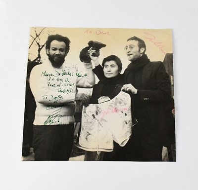 Lot 630 - JOHN LENNON; a black and white promotional...