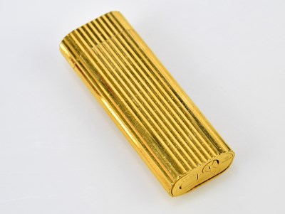 Lot 11 - CARTIER; a boxed Must de Cartier gold plated...