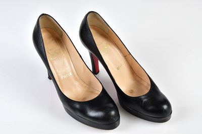 Lot 1068 - CHRISTIAN LOUBOUTIN; a pair of black platform...