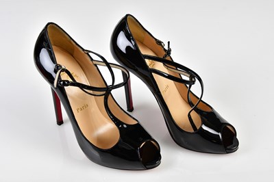 Lot 1061 - CHRISTIAN LOUBOUTIN: a pair of black patent...
