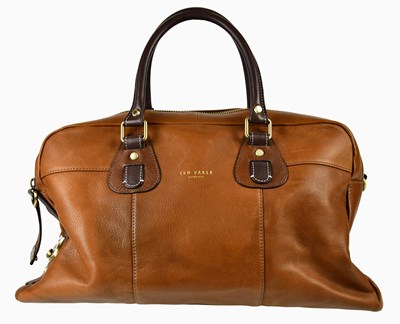 Lot 899 - TED BAKER; a soft brown calfskin leather...