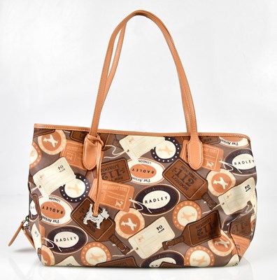 Lot 890 - RADLEY; an unused coated canvas holdall,...